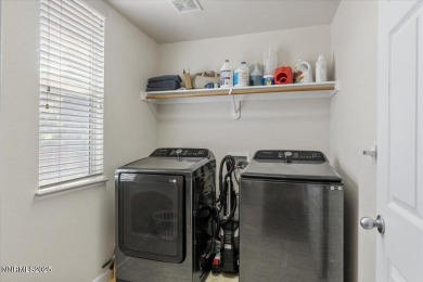 A rare gem, this beautifully maintained 4-bedroom, 2.5-bathroom on The Resort At Red Hawk  in Nevada - for sale on GolfHomes.com, golf home, golf lot