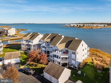 Discover waterfront living at its finest in this top floor, end on Bethany Bay Golf Club in Delaware - for sale on GolfHomes.com, golf home, golf lot