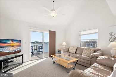 Discover waterfront living at its finest in this top floor, end on Bethany Bay Golf Club in Delaware - for sale on GolfHomes.com, golf home, golf lot