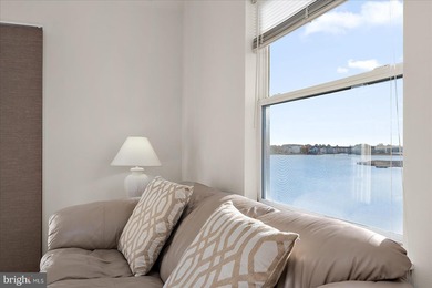 Discover waterfront living at its finest in this top floor, end on Bethany Bay Golf Club in Delaware - for sale on GolfHomes.com, golf home, golf lot