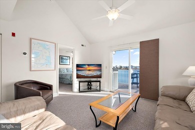 Discover waterfront living at its finest in this top floor, end on Bethany Bay Golf Club in Delaware - for sale on GolfHomes.com, golf home, golf lot