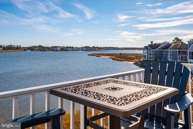 Discover waterfront living at its finest in this top floor, end on Bethany Bay Golf Club in Delaware - for sale on GolfHomes.com, golf home, golf lot