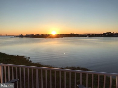 Discover waterfront living at its finest in this top floor, end on Bethany Bay Golf Club in Delaware - for sale on GolfHomes.com, golf home, golf lot