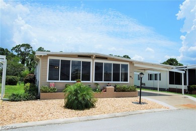 Updated and move-in ready, this residence is nestled in the on Six Lakes Country Club in Florida - for sale on GolfHomes.com, golf home, golf lot