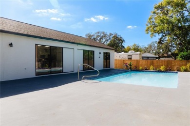 Live the Florida Dream in this Stunning Corner Lot Home on 1/3 on Heather Golf and Country Club in Florida - for sale on GolfHomes.com, golf home, golf lot