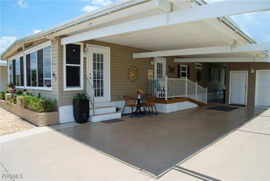 Updated and move-in ready, this residence is nestled in the on Six Lakes Country Club in Florida - for sale on GolfHomes.com, golf home, golf lot