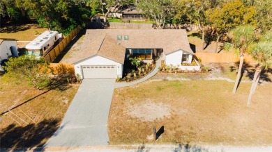 Live the Florida Dream in this Stunning Corner Lot Home on 1/3 on Heather Golf and Country Club in Florida - for sale on GolfHomes.com, golf home, golf lot