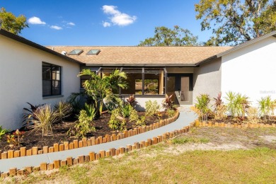 Live the Florida Dream in this Stunning Corner Lot Home on 1/3 on Heather Golf and Country Club in Florida - for sale on GolfHomes.com, golf home, golf lot