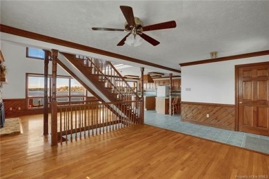 Let your worries and cares drift away at this waterfront retreat on Piankatank River Golf Club in Virginia - for sale on GolfHomes.com, golf home, golf lot