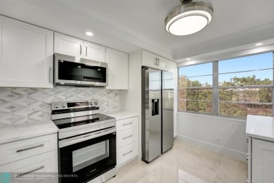 Stunning Corner Unit in Wynmoor! ALL appliances are NEW. NO on Wynmoor Golf Course in Florida - for sale on GolfHomes.com, golf home, golf lot