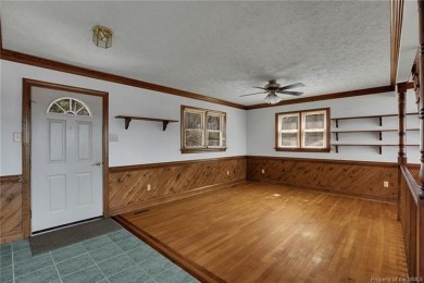 Let your worries and cares drift away at this waterfront retreat on Piankatank River Golf Club in Virginia - for sale on GolfHomes.com, golf home, golf lot