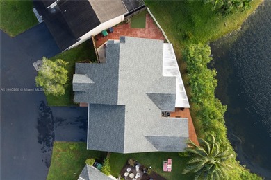 Charming One-Story Home with Golf and Lake Views in Doral Park! on Doral Golf Resort in Florida - for sale on GolfHomes.com, golf home, golf lot