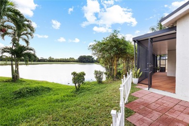 Charming One-Story Home with Golf and Lake Views in Doral Park! on Doral Golf Resort in Florida - for sale on GolfHomes.com, golf home, golf lot