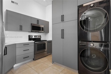 Charming One-Story Home with Golf and Lake Views in Doral Park! on Doral Golf Resort in Florida - for sale on GolfHomes.com, golf home, golf lot