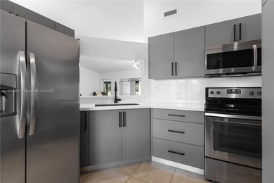 Charming One-Story Home with Golf and Lake Views in Doral Park! on Doral Golf Resort in Florida - for sale on GolfHomes.com, golf home, golf lot