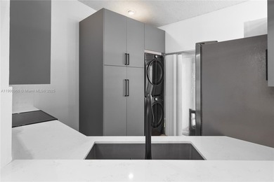 Charming One-Story Home with Golf and Lake Views in Doral Park! on Doral Golf Resort in Florida - for sale on GolfHomes.com, golf home, golf lot