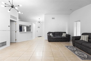 Charming One-Story Home with Golf and Lake Views in Doral Park! on Doral Golf Resort in Florida - for sale on GolfHomes.com, golf home, golf lot