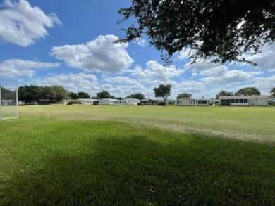 PRICE REDUCED $5,000! Step into this neatly furnished on Four Lakes Golf Club in Florida - for sale on GolfHomes.com, golf home, golf lot