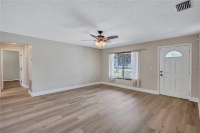Welcome to this beautifully updated 2 bedroom 2 bath home on Highland Lakes Executive Golf Course in Florida - for sale on GolfHomes.com, golf home, golf lot