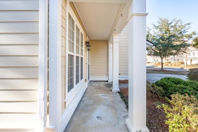 Welcome to 117 Fresh Meadow Lane, a stunning end-unit condo in on Dunes West Golf Club in South Carolina - for sale on GolfHomes.com, golf home, golf lot