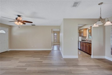 Welcome to this beautifully updated 2 bedroom 2 bath home on Highland Lakes Executive Golf Course in Florida - for sale on GolfHomes.com, golf home, golf lot