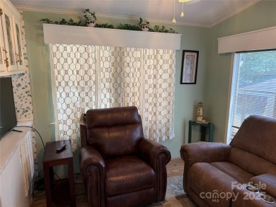 Welcome to 102 Papoose Ct. This 1999 Park Model is in great on The Tillery Tradition Country Club in North Carolina - for sale on GolfHomes.com, golf home, golf lot