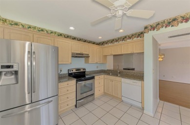 Stunning waterfront views in this villa home located in the on Plantation Golf and Country Club in Florida - for sale on GolfHomes.com, golf home, golf lot
