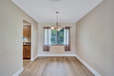 Welcome to this beautifully updated 2 bedroom 2 bath home on Highland Lakes Executive Golf Course in Florida - for sale on GolfHomes.com, golf home, golf lot