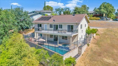 Stunning 3-Bedroom Lakeside Retreat in Lake Tulloch Shores! on The Club at Copper Valley Golf Course in California - for sale on GolfHomes.com, golf home, golf lot