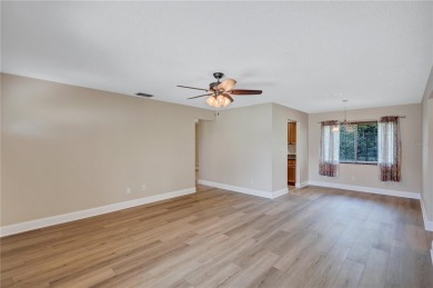Welcome to this beautifully updated 2 bedroom 2 bath home on Highland Lakes Executive Golf Course in Florida - for sale on GolfHomes.com, golf home, golf lot
