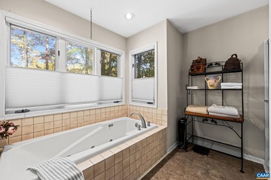 Enjoy peaceful mornings sipping coffee and relaxing evenings on Lake Monticello Golf Course in Virginia - for sale on GolfHomes.com, golf home, golf lot