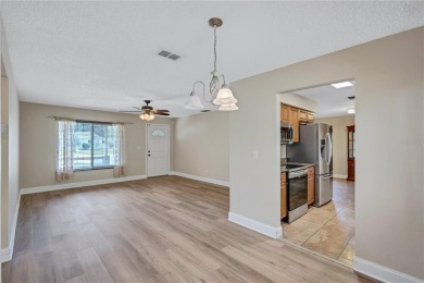 Welcome to this beautifully updated 2 bedroom 2 bath home on Highland Lakes Executive Golf Course in Florida - for sale on GolfHomes.com, golf home, golf lot