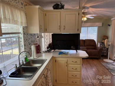 Welcome to 102 Papoose Ct. This 1999 Park Model is in great on The Tillery Tradition Country Club in North Carolina - for sale on GolfHomes.com, golf home, golf lot