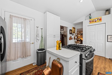 Enjoy peaceful mornings sipping coffee and relaxing evenings on Lake Monticello Golf Course in Virginia - for sale on GolfHomes.com, golf home, golf lot