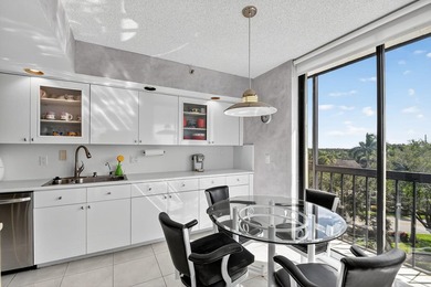 Spectacular golf, lake & tropical garden views from your wrap on Fountains Golf and Country Club in Florida - for sale on GolfHomes.com, golf home, golf lot