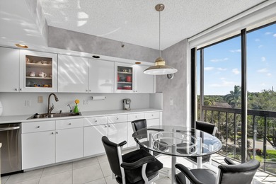 Spectacular golf, lake & tropical garden views from your wrap on Fountains Golf and Country Club in Florida - for sale on GolfHomes.com, golf home, golf lot