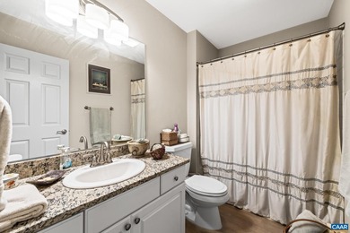 Enjoy peaceful mornings sipping coffee and relaxing evenings on Lake Monticello Golf Course in Virginia - for sale on GolfHomes.com, golf home, golf lot