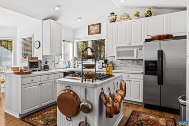 Enjoy peaceful mornings sipping coffee and relaxing evenings on Lake Monticello Golf Course in Virginia - for sale on GolfHomes.com, golf home, golf lot