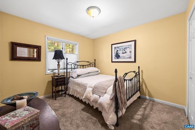 Enjoy peaceful mornings sipping coffee and relaxing evenings on Lake Monticello Golf Course in Virginia - for sale on GolfHomes.com, golf home, golf lot