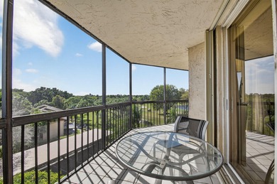 Spectacular golf, lake & tropical garden views from your wrap on Fountains Golf and Country Club in Florida - for sale on GolfHomes.com, golf home, golf lot