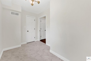 This expansive residence in Sedalia, MO, offers generous living on Sedalia Country Club in Missouri - for sale on GolfHomes.com, golf home, golf lot