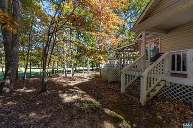 Enjoy peaceful mornings sipping coffee and relaxing evenings on Lake Monticello Golf Course in Virginia - for sale on GolfHomes.com, golf home, golf lot
