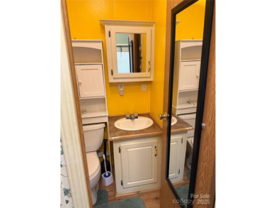 Welcome to 102 Papoose Ct. This 1999 Park Model is in great on The Tillery Tradition Country Club in North Carolina - for sale on GolfHomes.com, golf home, golf lot