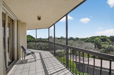 Spectacular golf, lake & tropical garden views from your wrap on Fountains Golf and Country Club in Florida - for sale on GolfHomes.com, golf home, golf lot