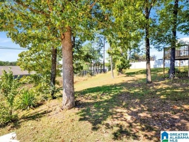 Nestled on a peaceful street in Woodland Hills, this charming on Frank House Municipal Golf Course in Alabama - for sale on GolfHomes.com, golf home, golf lot