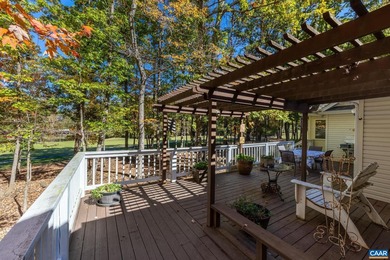 Enjoy peaceful mornings sipping coffee and relaxing evenings on Lake Monticello Golf Course in Virginia - for sale on GolfHomes.com, golf home, golf lot
