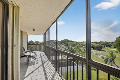 Spectacular golf, lake & tropical garden views from your wrap on Fountains Golf and Country Club in Florida - for sale on GolfHomes.com, golf home, golf lot