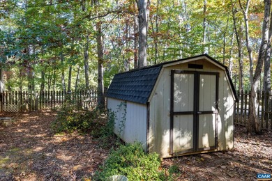 Enjoy peaceful mornings sipping coffee and relaxing evenings on Lake Monticello Golf Course in Virginia - for sale on GolfHomes.com, golf home, golf lot