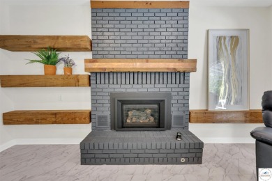 This expansive residence in Sedalia, MO, offers generous living on Sedalia Country Club in Missouri - for sale on GolfHomes.com, golf home, golf lot
