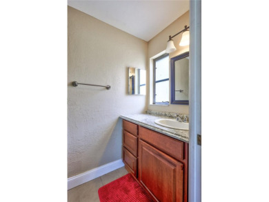Welcome to this beautifully updated 2 bedroom 2 bath home on Highland Lakes Executive Golf Course in Florida - for sale on GolfHomes.com, golf home, golf lot